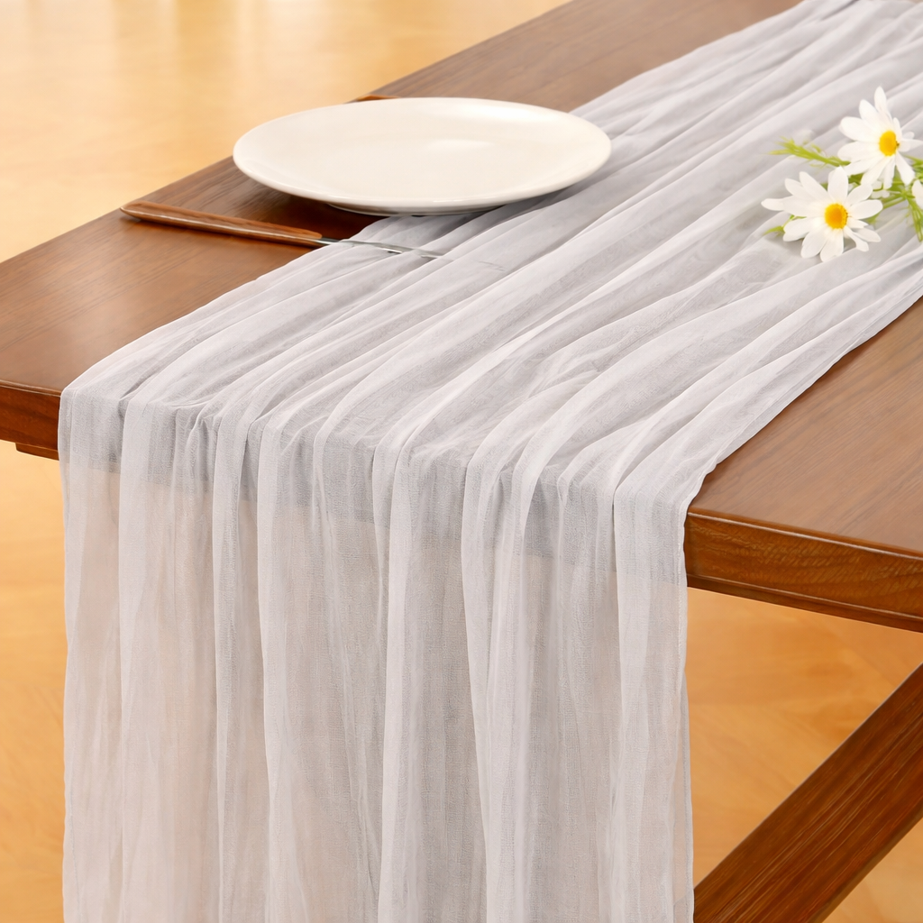 Stylish light grey table runner styled on a modern wooden dining table